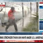 Fox News reporter uses water plume from an open fire hydrant to depict the effects of Hurricane Ian (VIDEO)